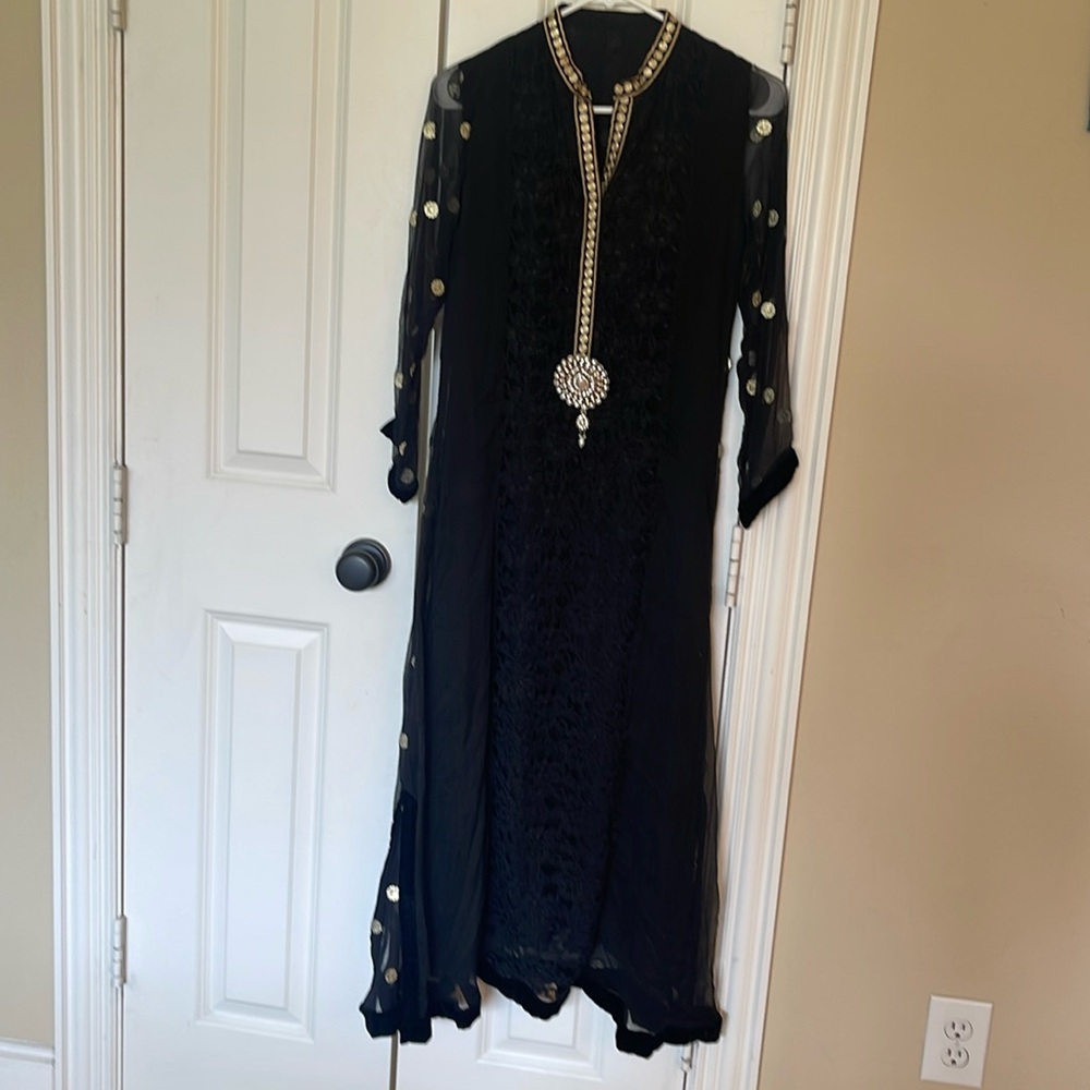 Pakistani Indian kurta black with gold tilla and brooch.